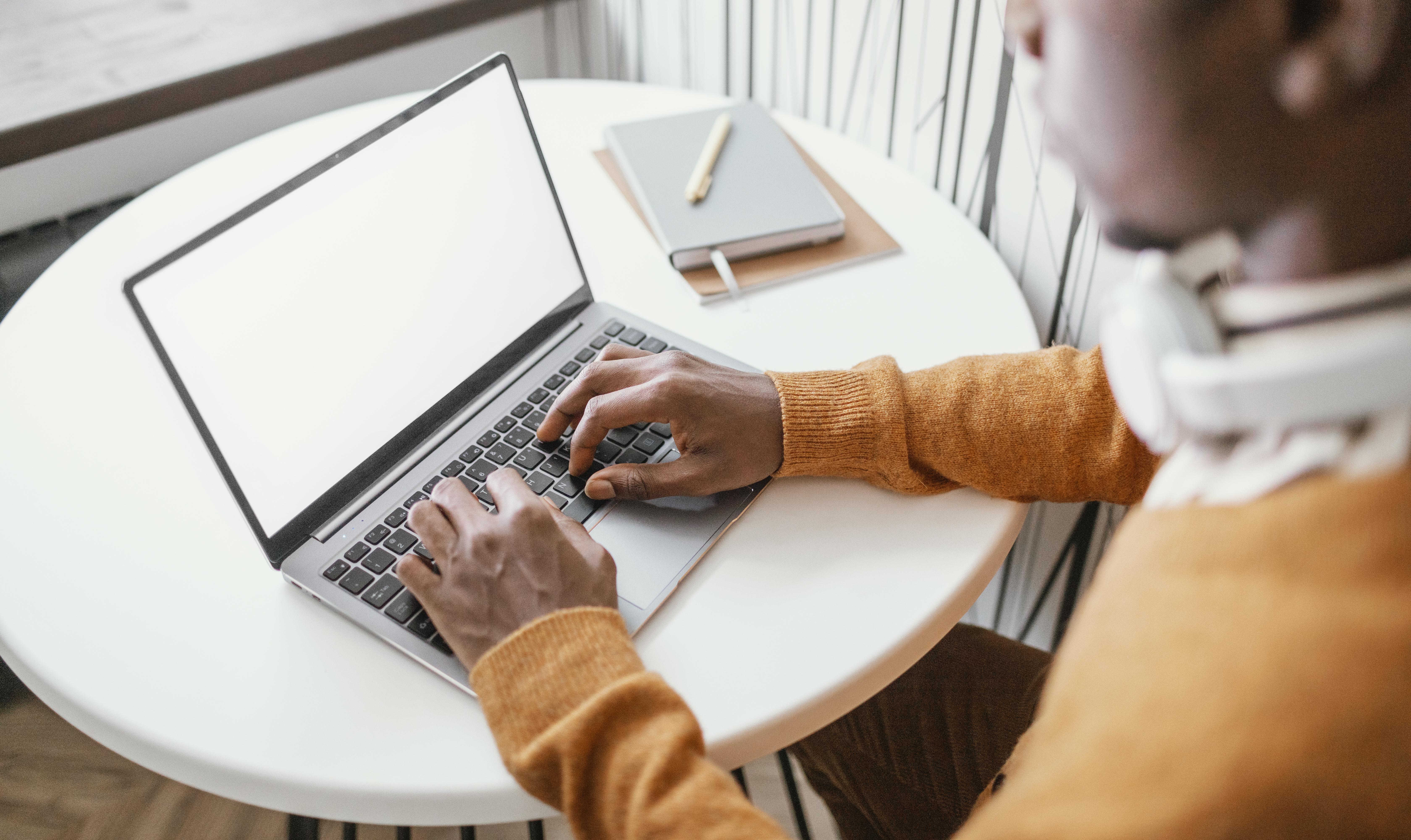 Researcher working from home reviewing grant opportunities